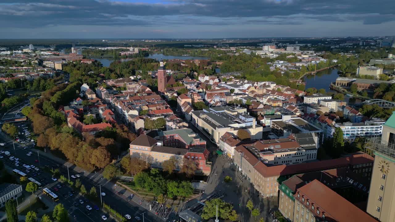 Aerial view showing Rathaus Spandau building, subway station, and public transportation in Berlin. Fabulous aerial view flight overflight flyover drone