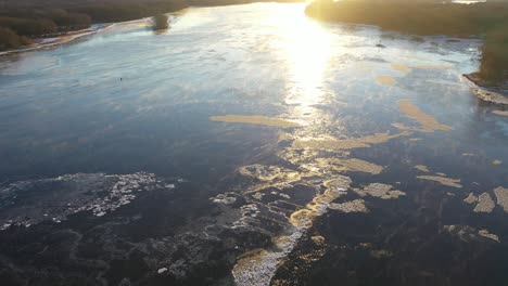 frozen river at sunset