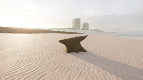 old anvil on a sandy beach