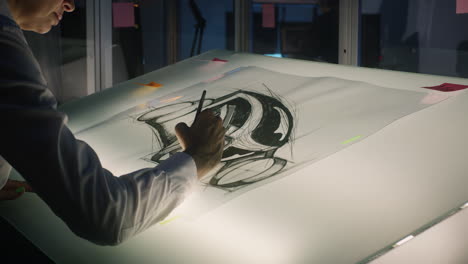designer drawing a sketch