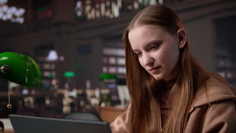 vertical video female student makes final preparations for her university periodicals