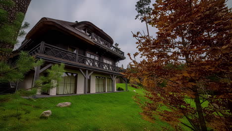 cozy chalet in a autumn forest - sliding, panning motion time lapse