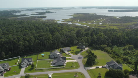 coastal homes with river and salt marsh behind neighborhood