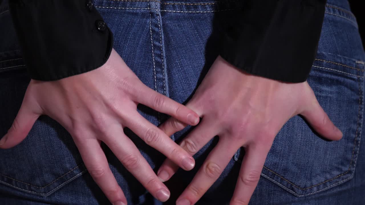 Sudden attack of anal pain and putting hands on a buttocks, massaging