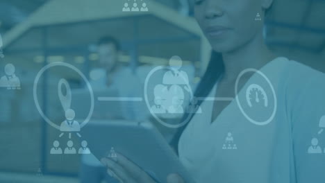 animation of network of connections with icons over businesswoman