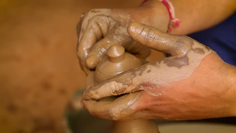 potter at work makes ceramic dishes. india, rajasthan.