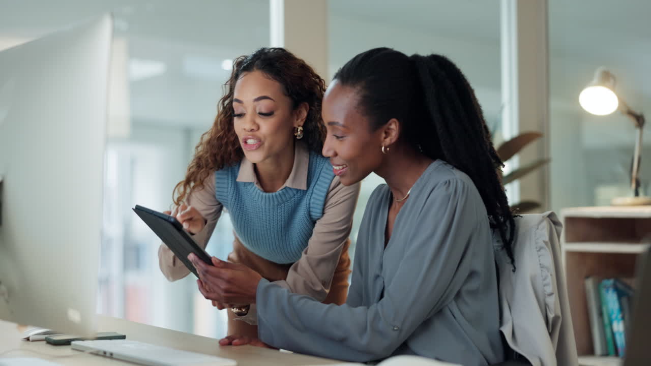 Business women, tablet and talking in office