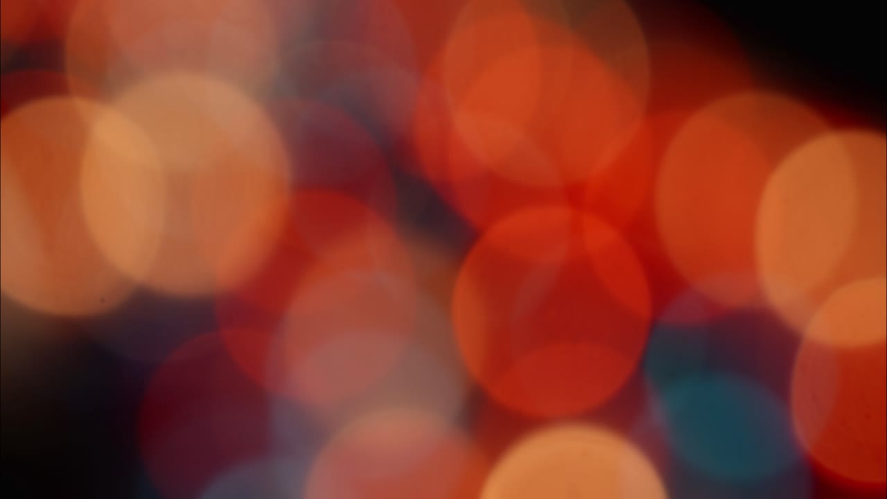 Abstract Bokeh Lights Shimmering in Warm Colors