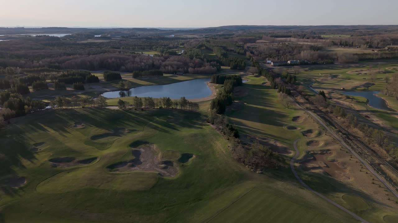 Small Pond Near Golf Course Of TPC Toronto At Osprey Valley In Alton Town, Caledon Region, Ontario, Canada. Aerial Drone Shot