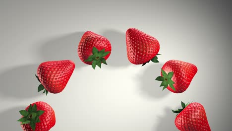 3d animation of strawberries. fresh strawberries with green leaves on a white background. sweet fruits. the concept of a healthy lifestyle and nutrition in general. rotate the strawberries. shadow.