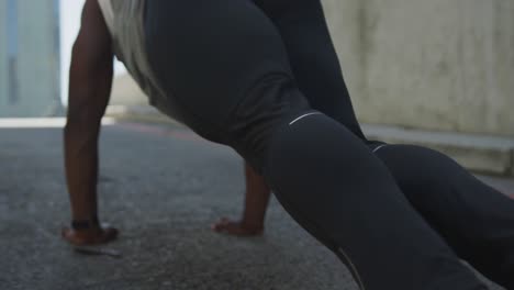 man exercising in an urban setting