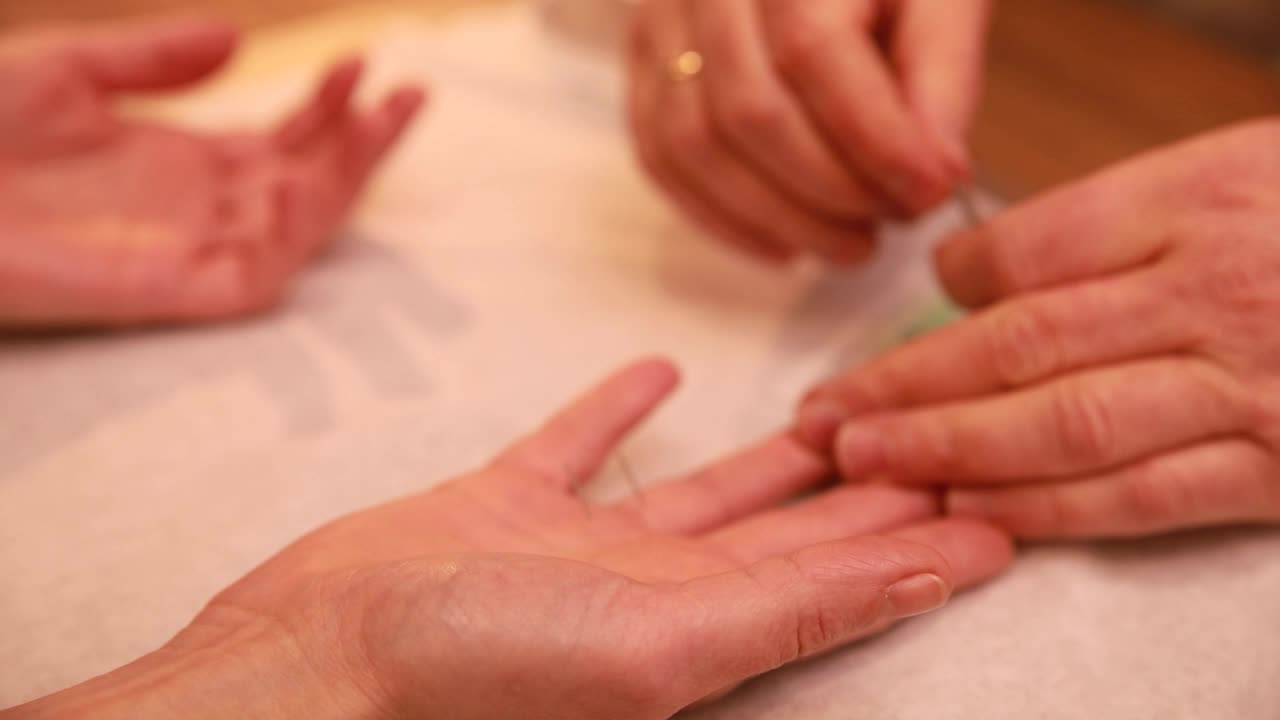 sesión de quirómania