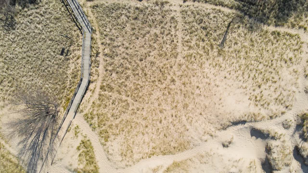 Tracking along the boardwalk on Lake Michigan's shore