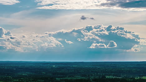 cumulus clouds forming time lapse over rural countryside forest national park aerial drone