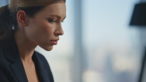 employee hands typing laptop keyboard closeup. pensive woman looking inspiration