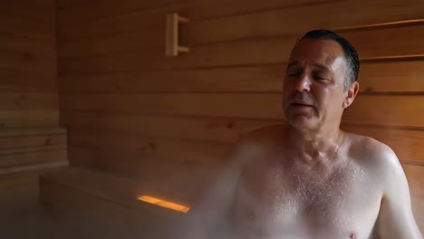 man relaxing in a sauna