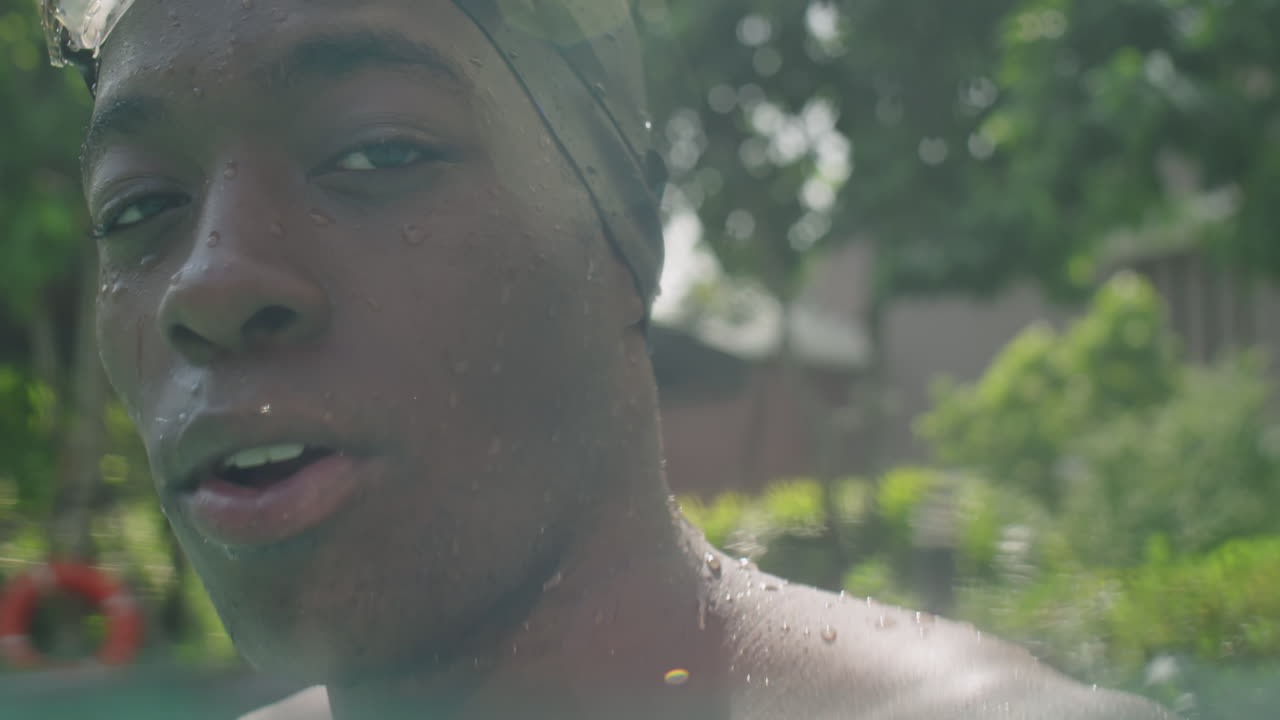 Portrait of Black Man after Swimming in Outdoor Pool