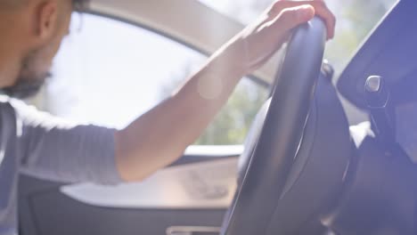 Close-up-video-of-driving-a-car-on-a-sunny-day