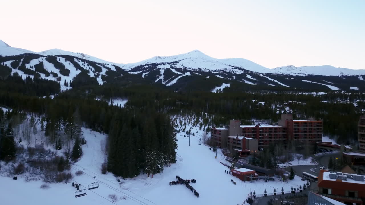 Jesus Cross Mountain and Valleys winter Breckenridge Sunset ski runs snow winter blue purple pan up Christ God people love Oct 2018