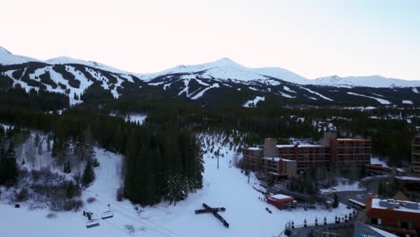 jesus cross mountain and valleys winter breckenridge sunset ski runs snow winter blue purple pan up christ god people love oct 2018