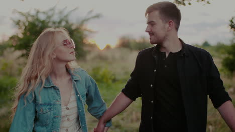 Joyful-Couple-Walking-And-Smiling-Outdoors-In-Summer-13