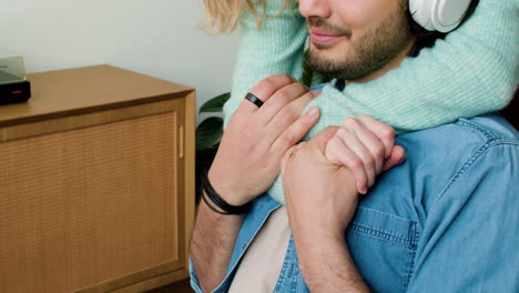 Young-man-listening-to-music-at-home