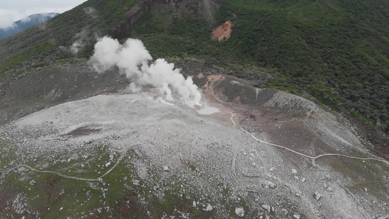 Aerial Drone Fly Mount Kirishima Volcano with White Smoke Crater, Kyushu Japan