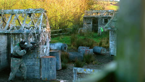 Man-shooting-his-paintball-gun