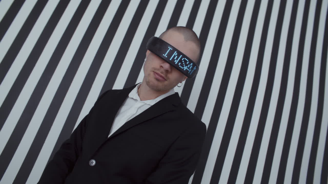 Man in VR Headset against Striped Background