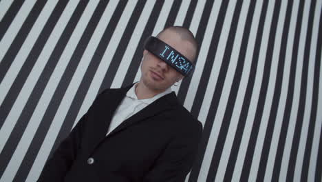 man in vr headset against striped background
