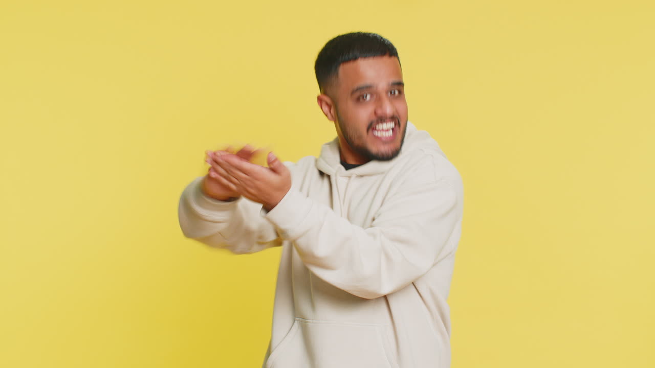 Man showing wasting throwing sharing money more tips big profit winning lottery jackpot shopping
