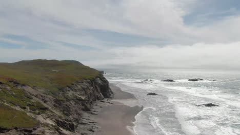 coastal cliffs to the ocean, drone shot