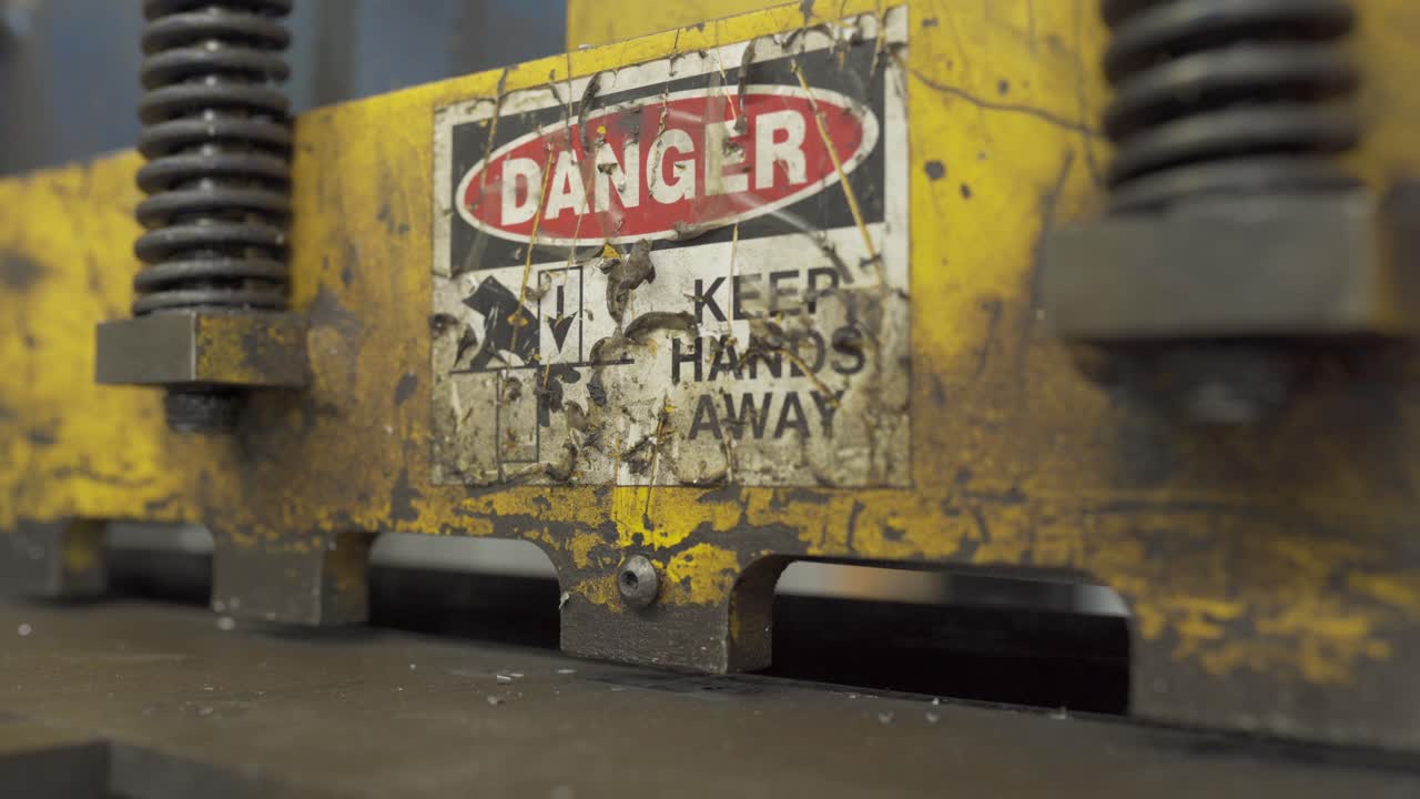 Industrial Metal Shear Operating During Manufacturing Production