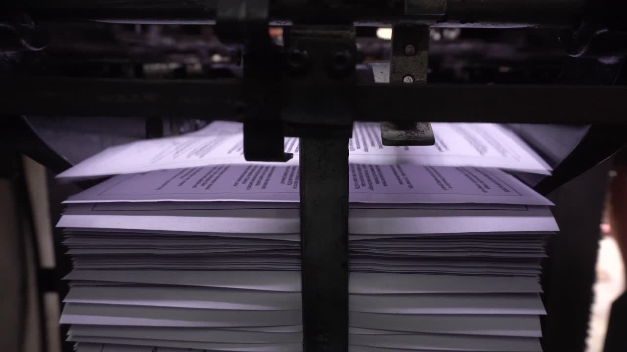 Books are being printed through machines