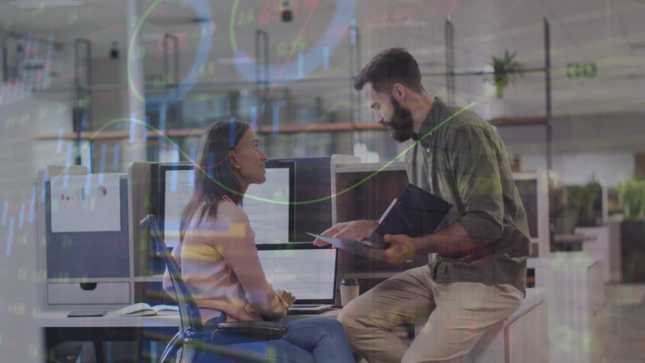 Animation of graphs, trading board and loading circles over diverse coworkers discussing on desk