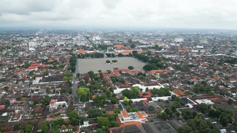 aerial drone shot of housing and northern square in yogyakarta