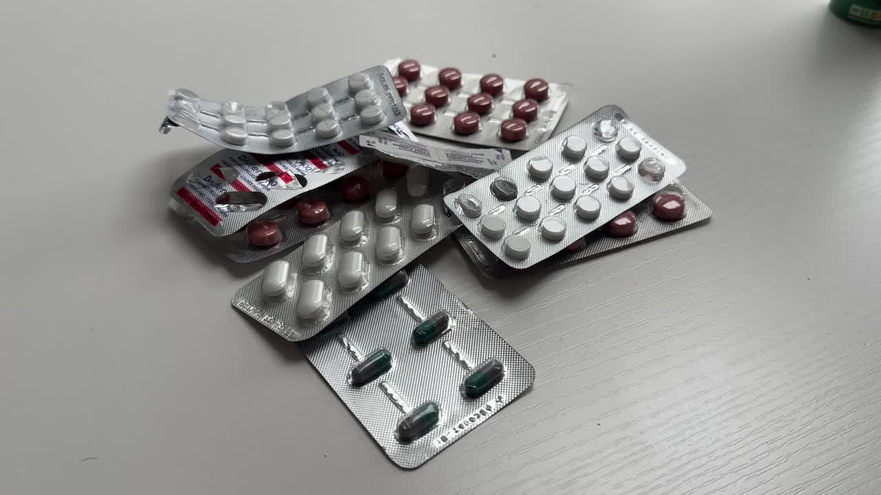 Close up shot of travel medicine pills medical supplies Imodium anti diarrhoea sickness tablets ibuprofen