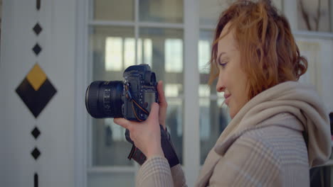 woman taking photo outdoors