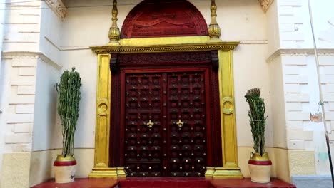 establisher view of elegant style indian door in zanzibar indian neighbourhood