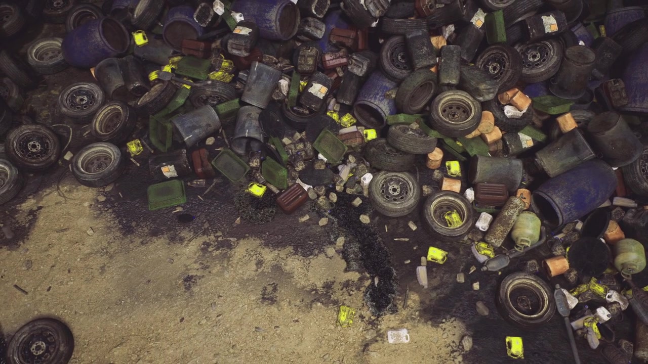 Debris from tires and packaging scattered over damp shoreline scene