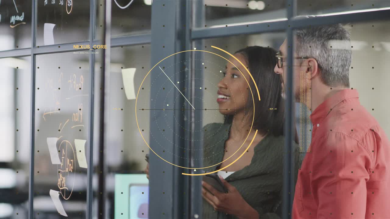 Man pointing at stickies, woman holding phone mapping product plan, HUD circle growing over glass