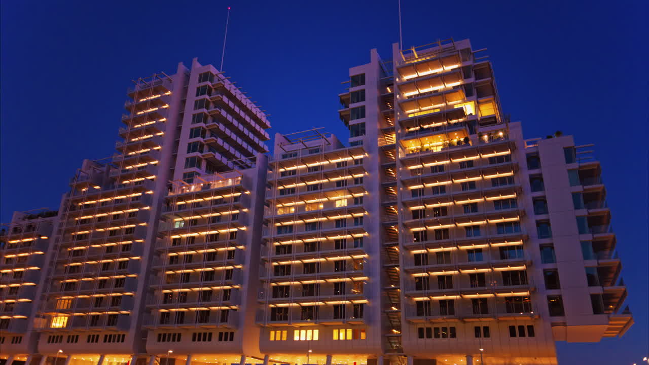 Buildings in Mareterra new Residential district in Monaco in the evening