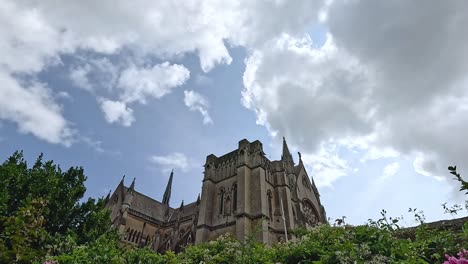 castle with lush greenery and cloudy sky