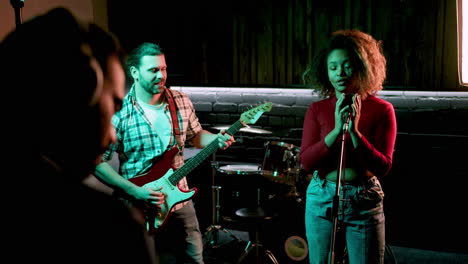 musical group in the studio