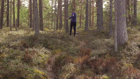 Stretching-in-the-woods-being-lost-trying-to-figure-way-out