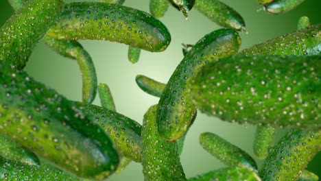 green cucumbers falling down. slow motion.