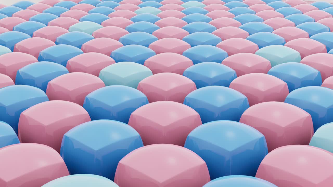 Rows Of Pastel Colored Smooth Ovals On Textured Surface