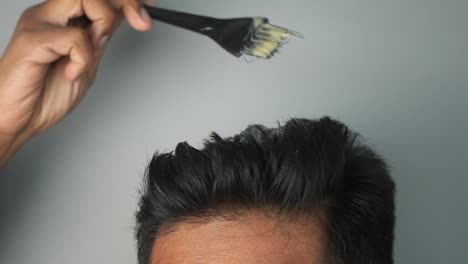 applying hair dye