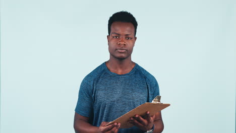 Smile,-fitness-and-black-man-with-clipboard