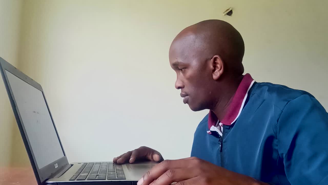 young Africa man using laptop